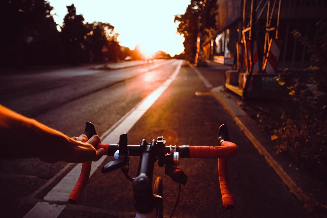 a man exercising on a bike which is one way to transmute sexual energy..