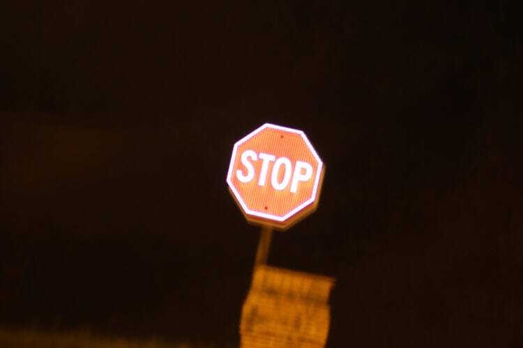 A stop sign signifying how people should take care with pornography because it can negatively impact their life. 